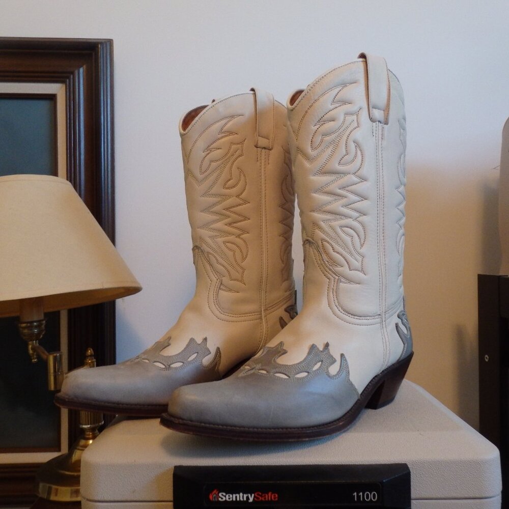 gray and white cowboy boots